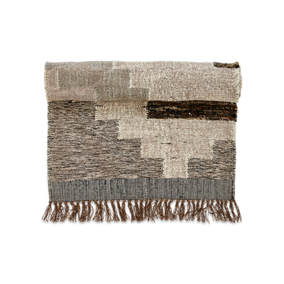 wool and cotton mix rug in earth tones