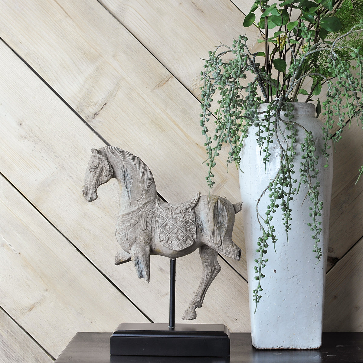 white horse on a stand