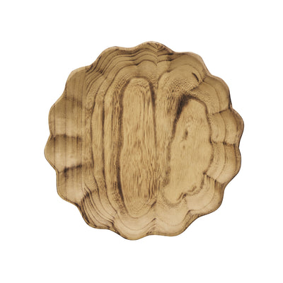 Wooden decorative item with a scalloped edge on a white background