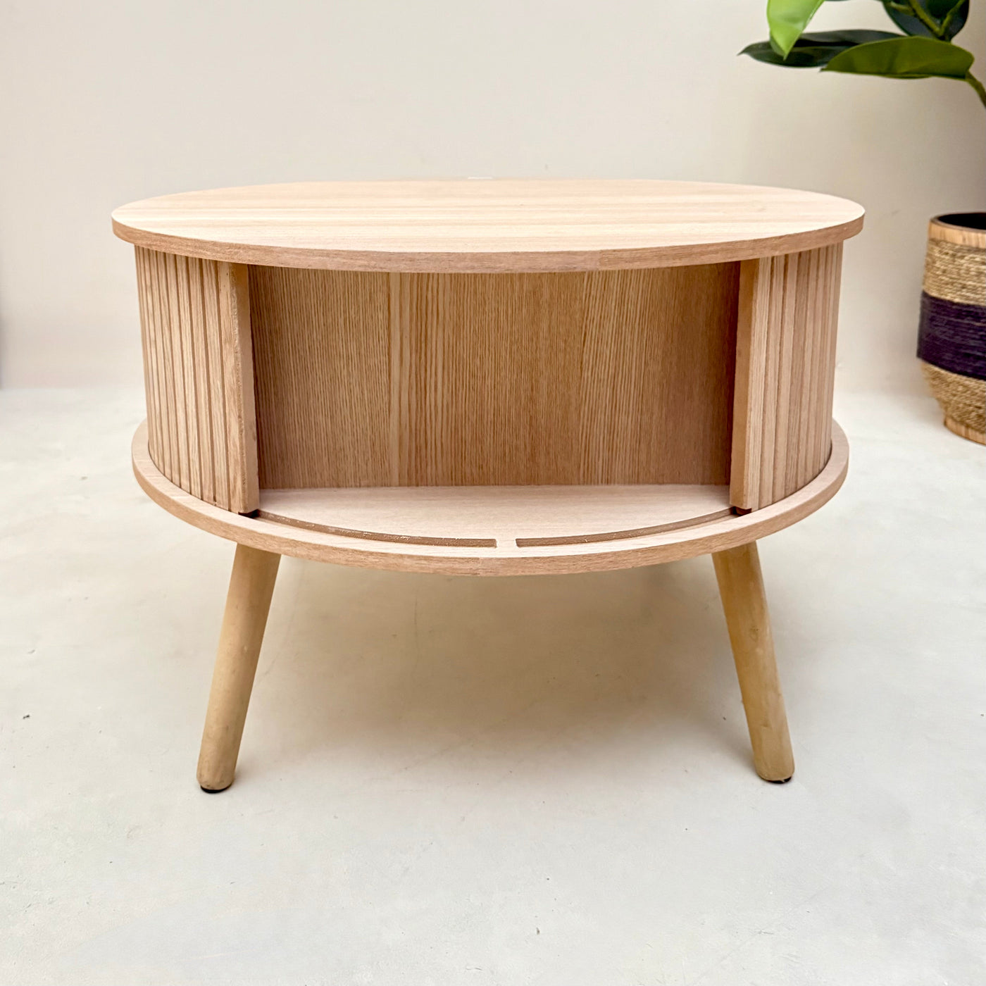 Bernt ROUND SLIDE DOOR Coffee table