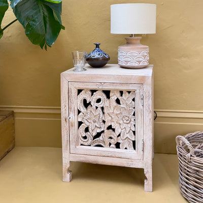 Carved bedside cabinet