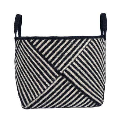 Black and white striped woven basket on a white background