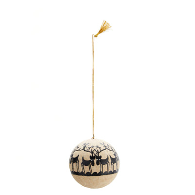 Decorative ball with reindeer design and gold tassel on a white background