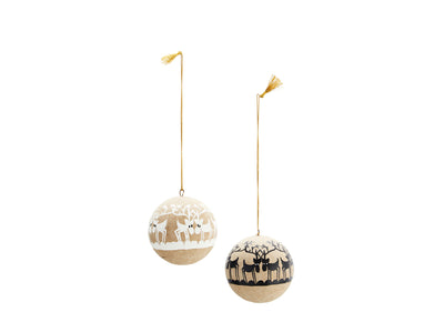 Two decorative balls with reindeer patterns on a white background