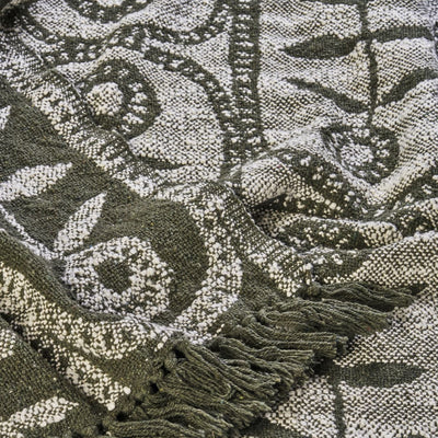 Close-up of a patterned fabric with intricate designs.