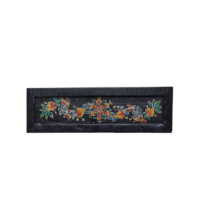 Decorative wooden tray with floral patterns on a white background