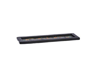 Long, narrow black tray with decorative elements on a white background