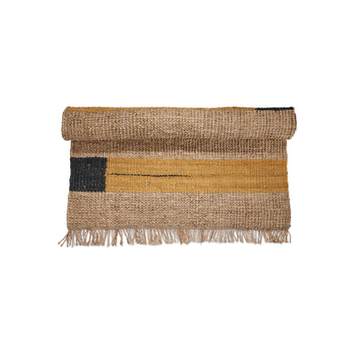 hemp-and-seagrass-rug-with-yellow-black-stripes-sand-60cm-90cm-rolled-up-close-up-nkuku