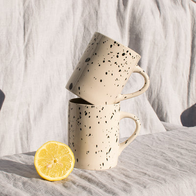 monochrome splatter mug close up