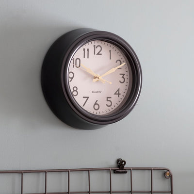 small monochrome wall clock