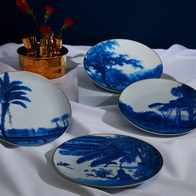 &Klevering-set-of-4-vintage-inspired-dining-plates-in-white-and-blue-palms-trees-bird-designs