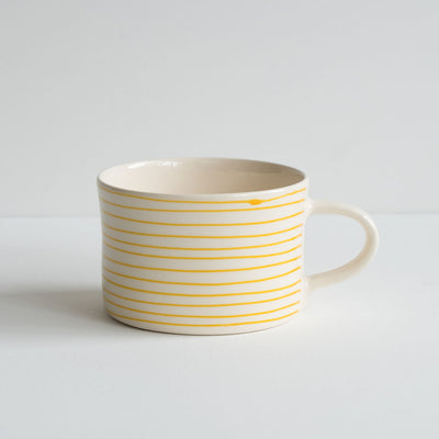 stoneware mug with yellow stripes